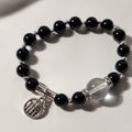 Black Obsidian and Clear Quartz bracelet with silver fortune charm